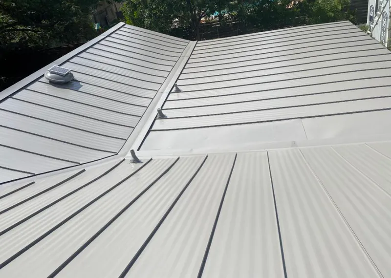 Solar attic fan installed on a metal roof for Roof Ventilation in Rancho Calaveras
